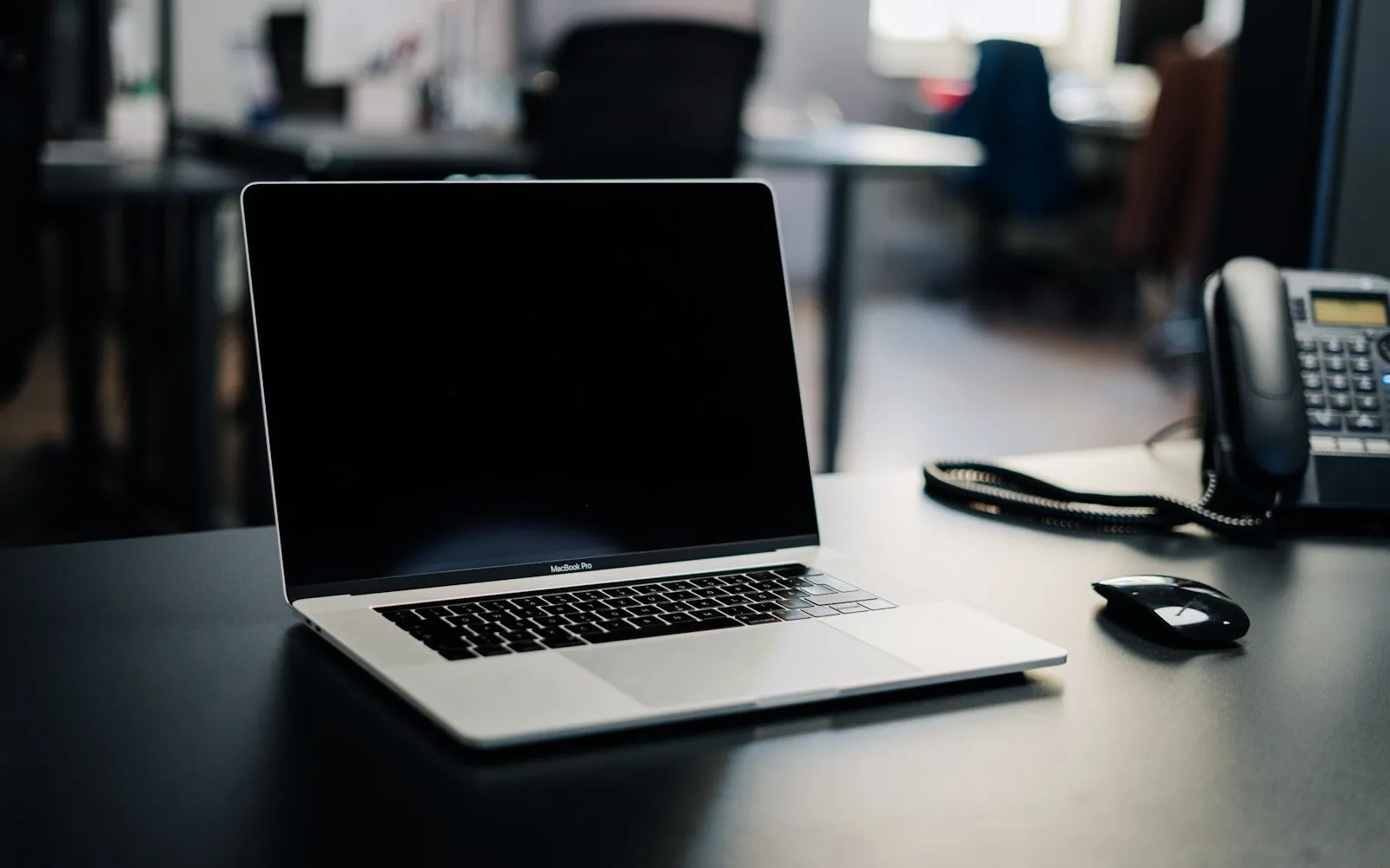 Charts and graphs from a job market report on a desk